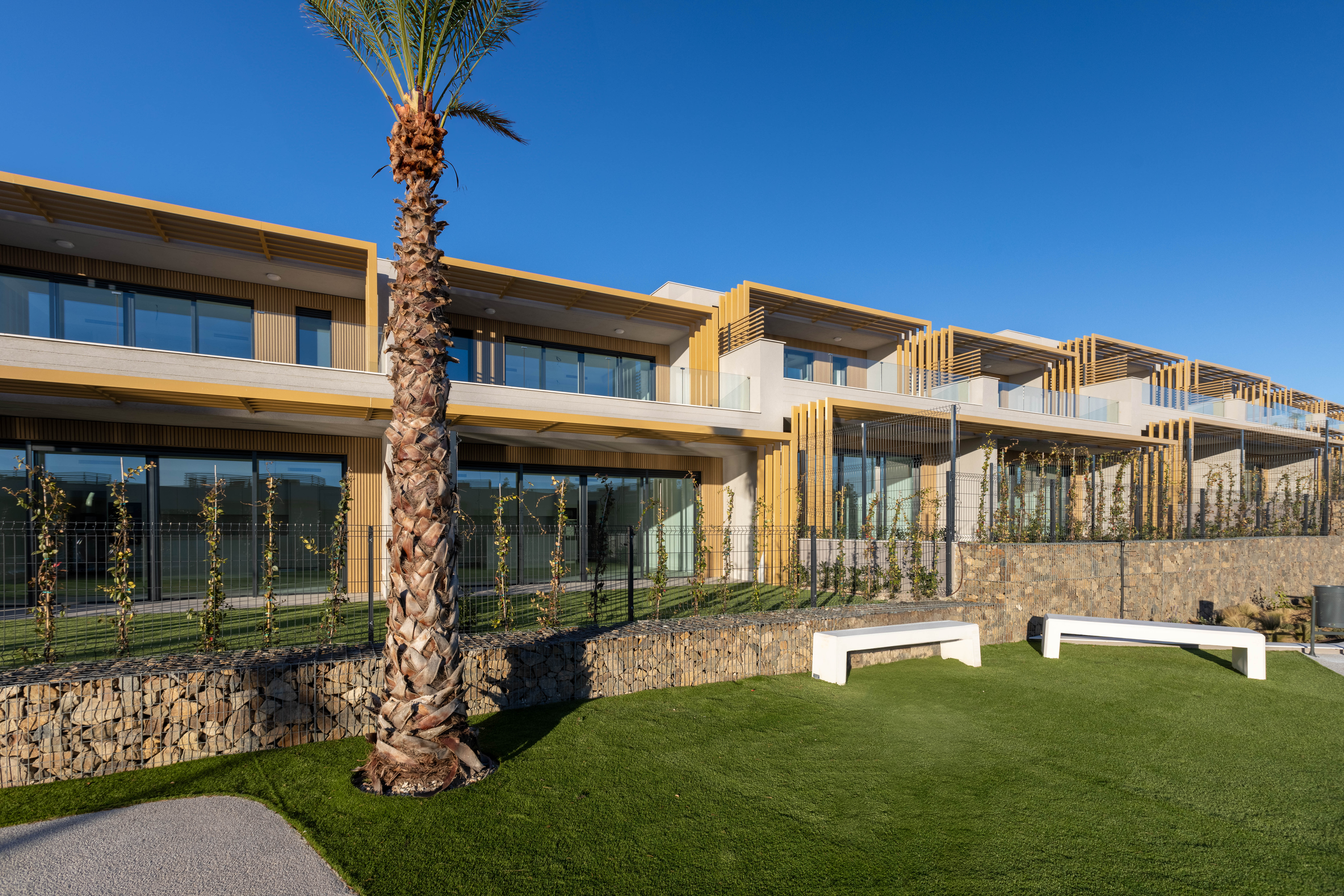Contemporary Townhouses Surrounded by Golf, Nature, and Mediterranean Comfort