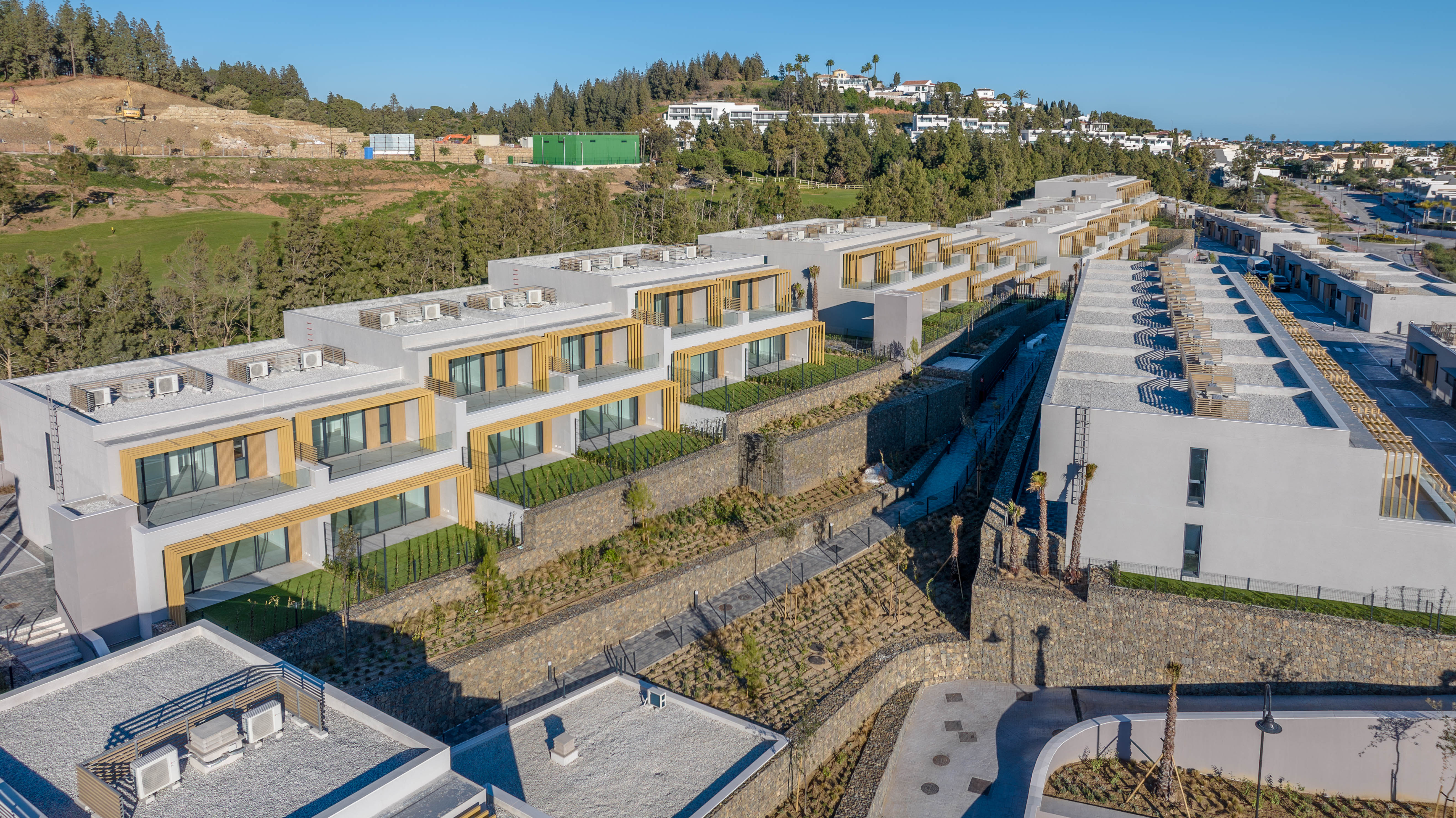 Contemporary Townhouses Surrounded by Golf, Nature, and Mediterranean Comfort