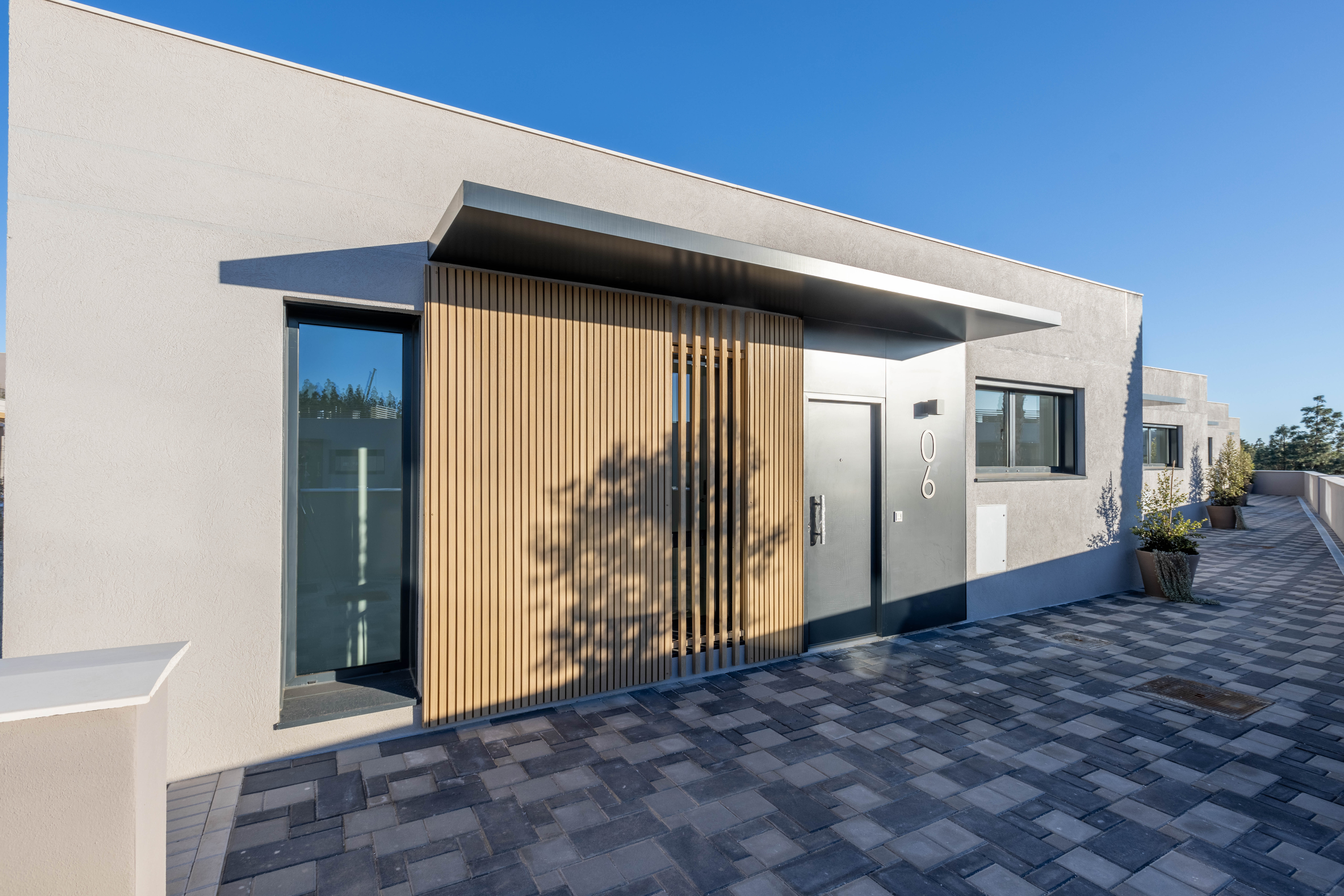 Contemporary Townhouses Surrounded by Golf, Nature, and Mediterranean Comfort