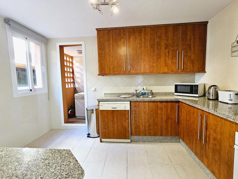 Elegant Apartment with Golf & Sea Views in Elviria – Fully Furnished and Move-In Ready