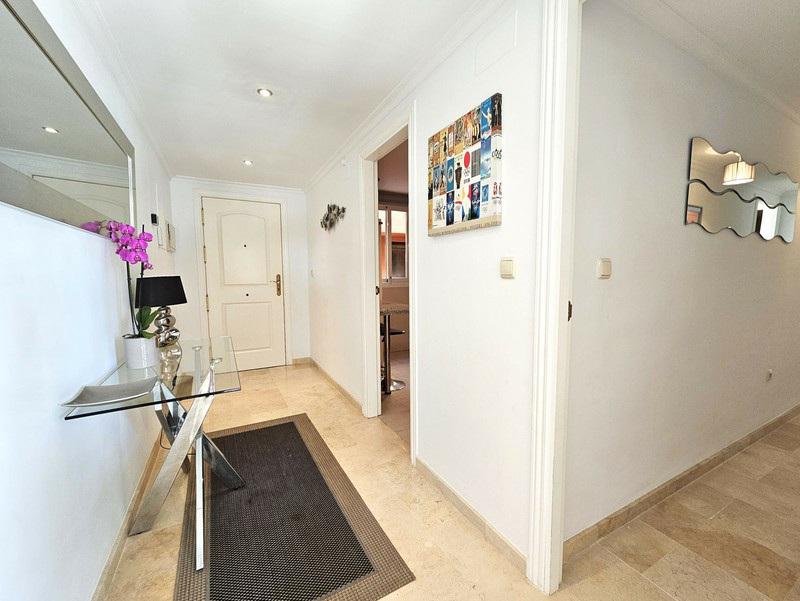 Elegant Apartment with Golf & Sea Views in Elviria – Fully Furnished and Move-In Ready