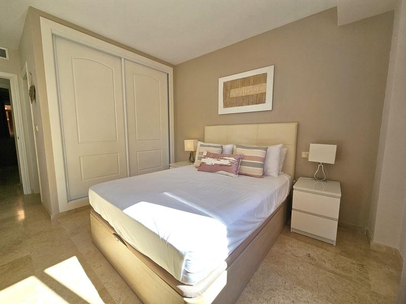 Elegant Apartment with Golf & Sea Views in Elviria – Fully Furnished and Move-In Ready