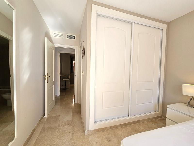 Elegant Apartment with Golf & Sea Views in Elviria – Fully Furnished and Move-In Ready