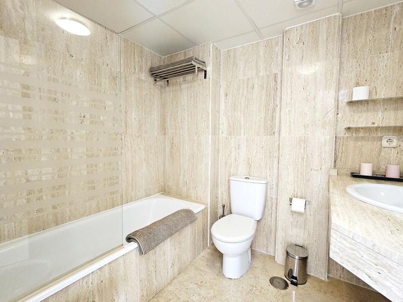 Elegant Apartment with Golf & Sea Views in Elviria – Fully Furnished and Move-In Ready
