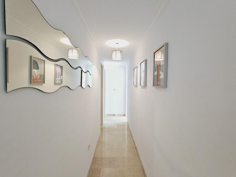 Elegant Apartment with Golf & Sea Views in Elviria – Fully Furnished and Move-In Ready