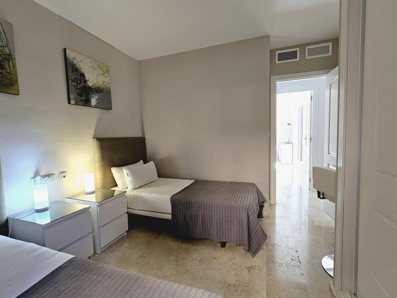 Elegant Apartment with Golf & Sea Views in Elviria – Fully Furnished and Move-In Ready