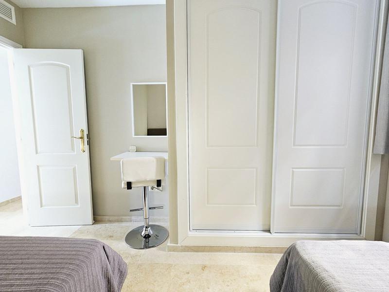 Elegant Apartment with Golf & Sea Views in Elviria – Fully Furnished and Move-In Ready