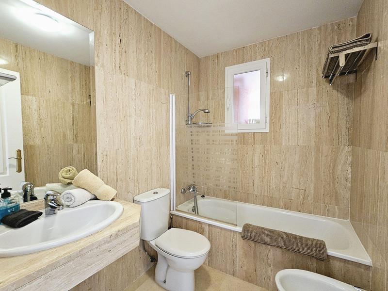 Elegant Apartment with Golf & Sea Views in Elviria – Fully Furnished and Move-In Ready