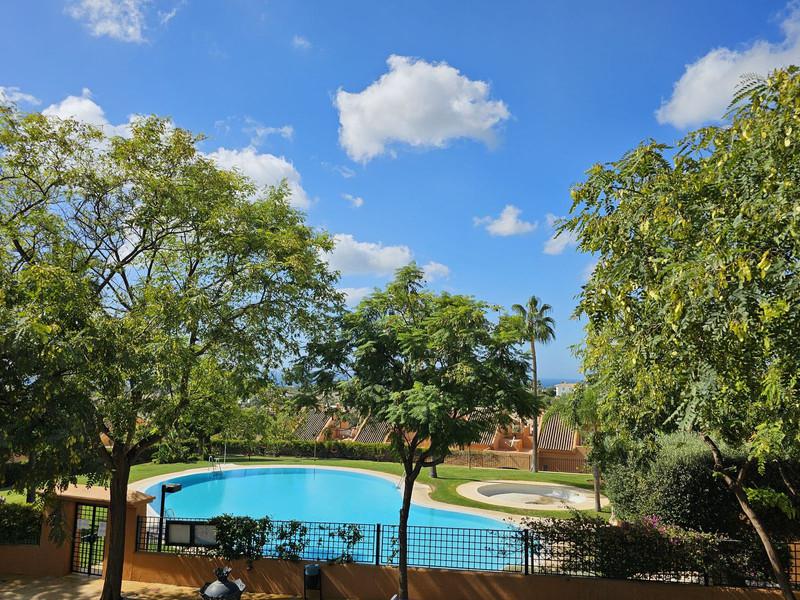 Elegant Apartment with Golf & Sea Views in Elviria – Fully Furnished and Move-In Ready