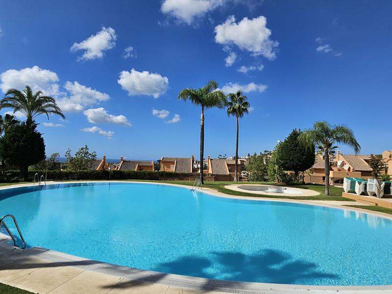 Elegant Apartment with Golf & Sea Views in Elviria – Fully Furnished and Move-In Ready